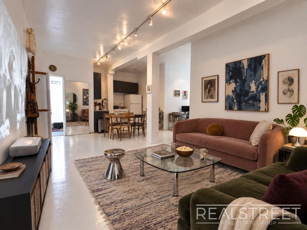 Living and dining room in the Williamsburg loft at 36 South 4th Street #B5